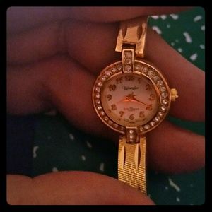 Vintage Woman's Wrangler Gold and Diamond Watch.